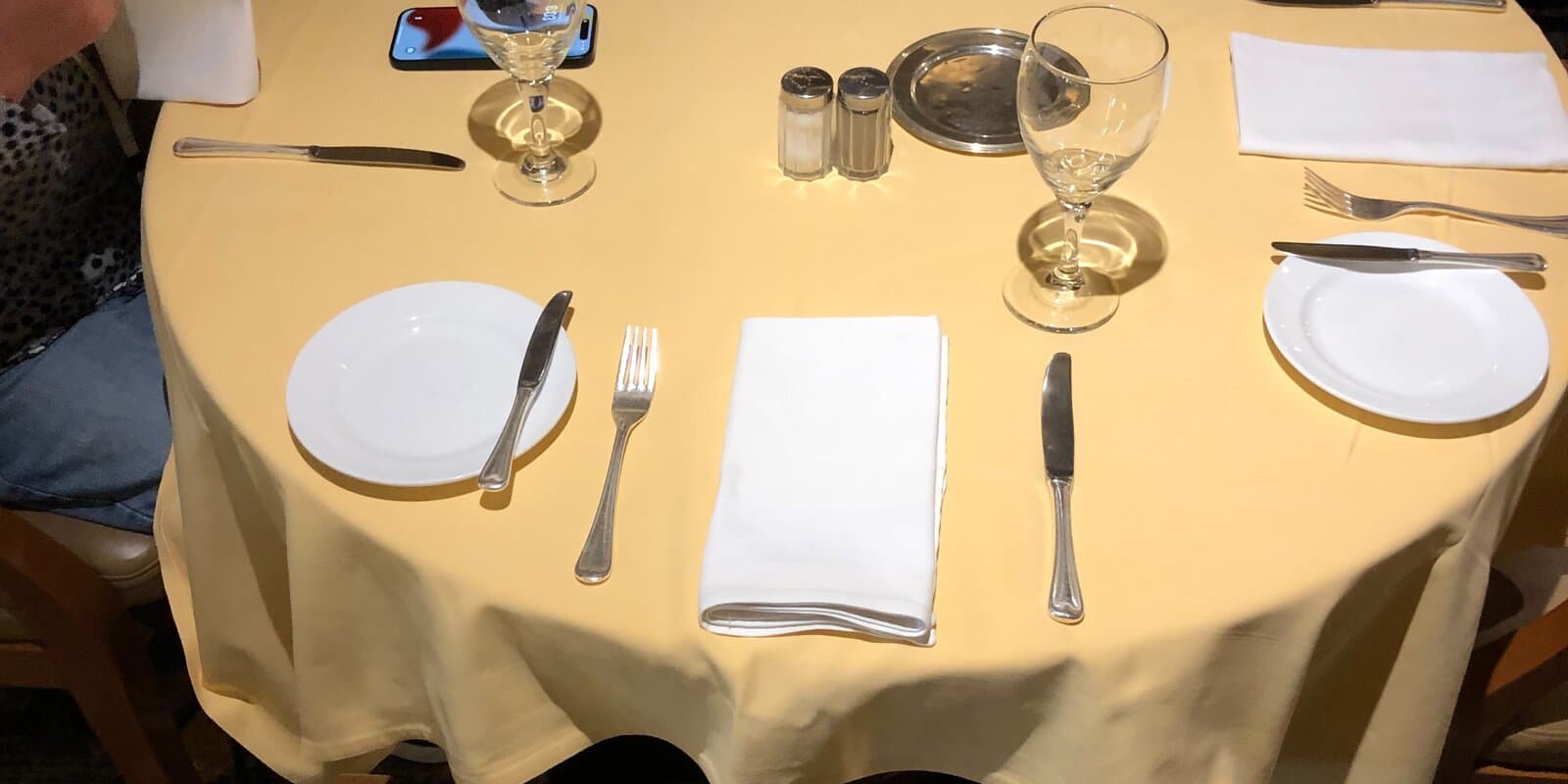 Formal place settings on a cruise ship dining table