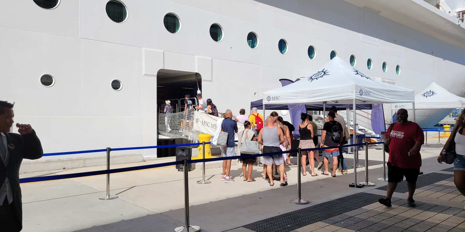 Cruise ship gangway at Nassau cruise port with passengers boarding