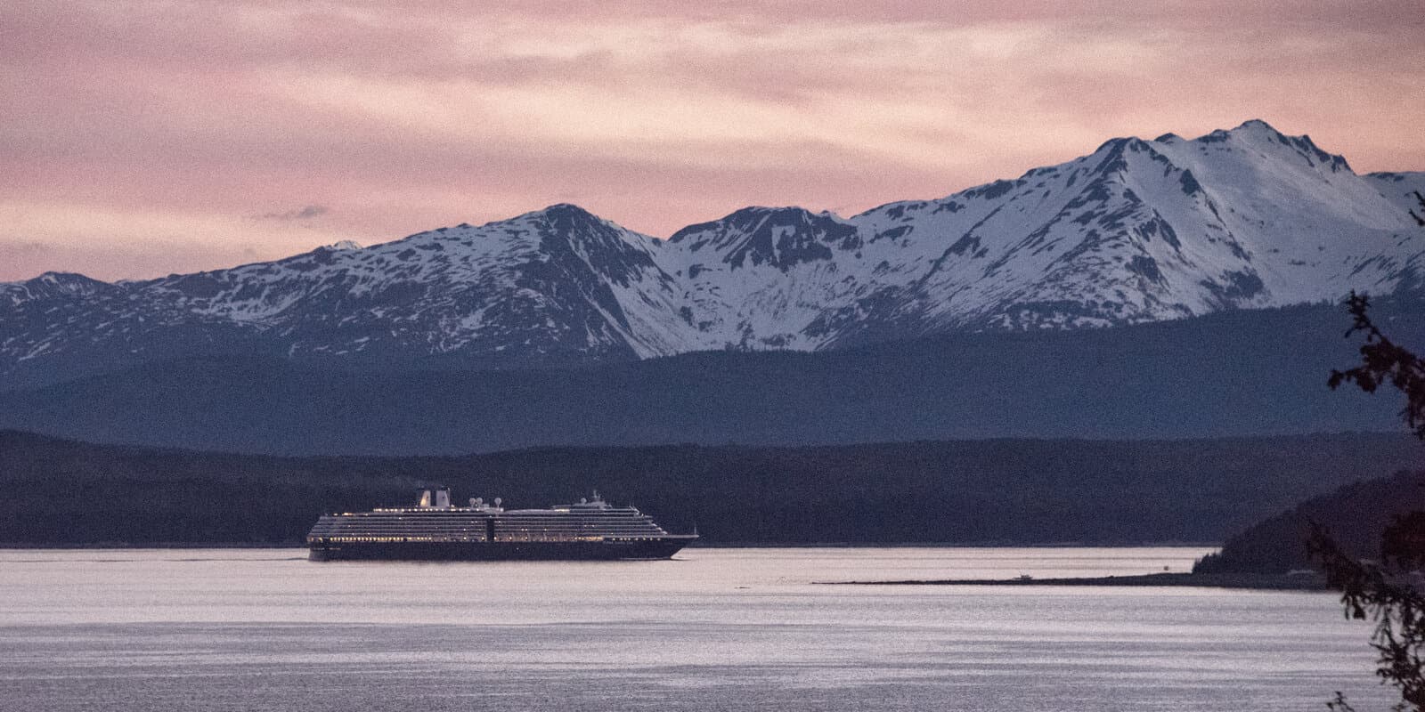 Holland America Line cruise ship in Southeast Alaska with glacier scenery