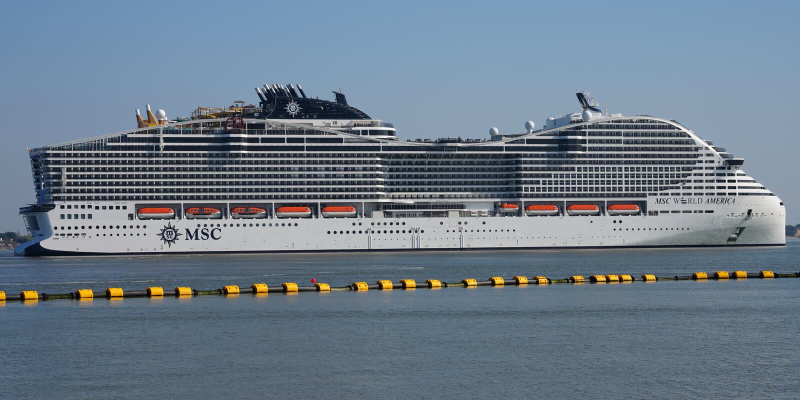 MSC World America, a World Class cruise ship, at the Saint-Nazaire shipyard — sister ship to MSC World Asia under construction