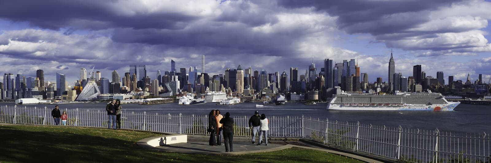 Cruise ship on the Hudson River with the Manhattan skyline — the view Northeast travelers get sailing from New York City