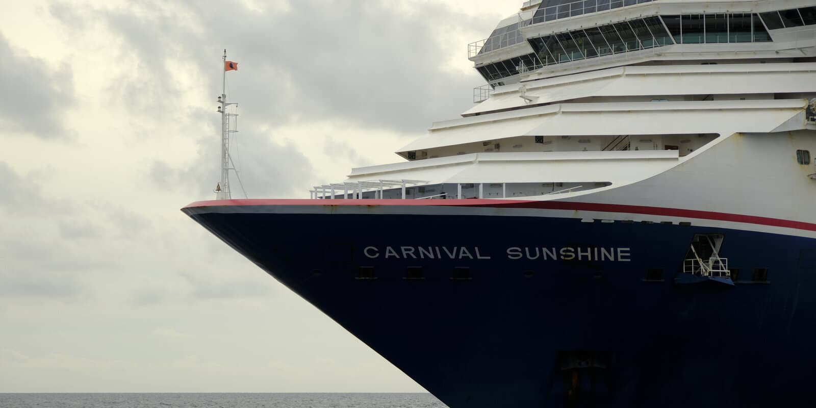 Carnival Sunshine cruise ship bow at sea under an overcast daylight sky