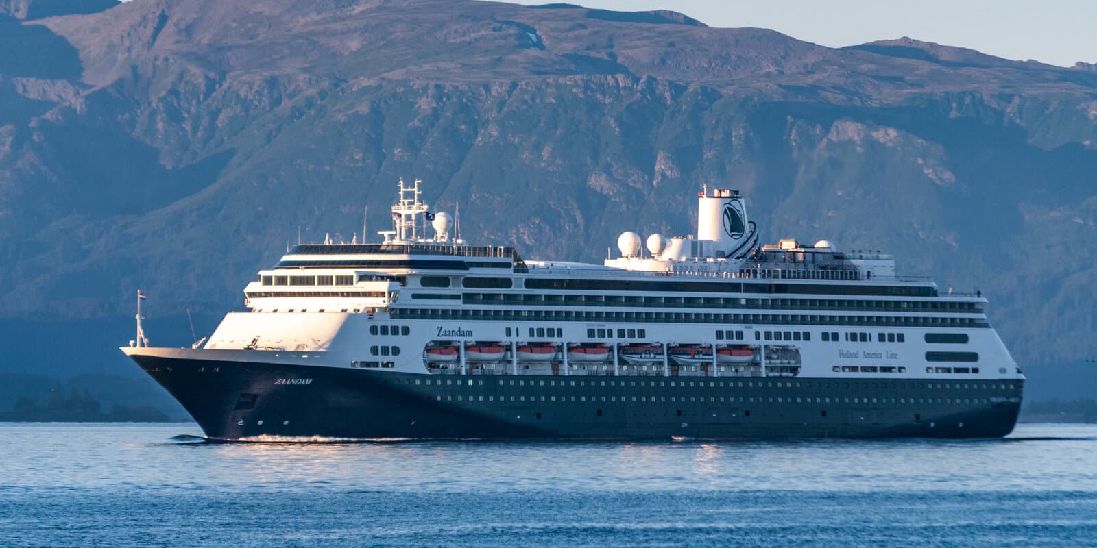 Holland America Zaandam cruise ship off Homer Spit, Alaska, with the ship name visible on the hull
