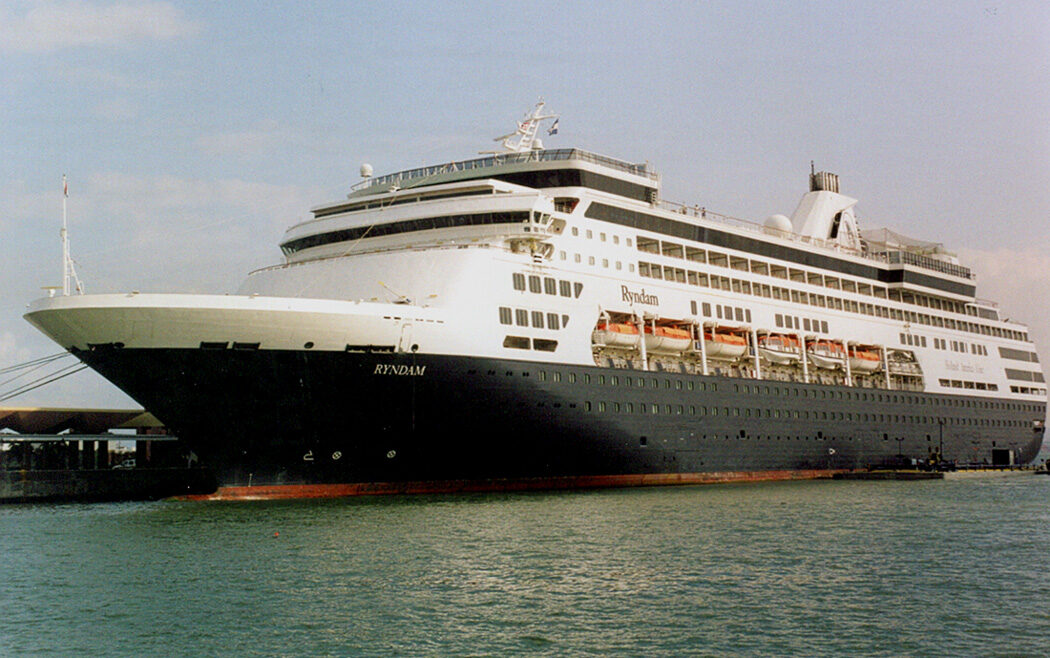 A Holland America cruise ship docked at an Old San Juan cruise pier